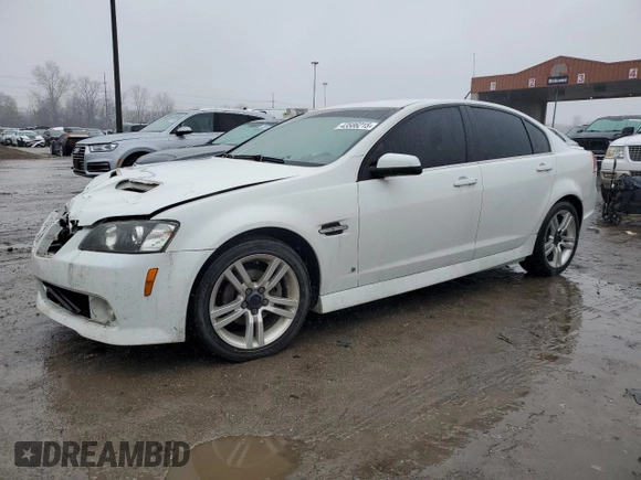 2009 Pontiac G8 with VIN 6G2ER57779L153098, listed as a Copart auction lot 43586215 with 136,321 mi miles and Salvage Title. Bid and sale history available at carsss.com. Image 1.
