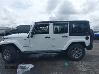 2016 Jeep Wrangler Unlimited Sahara with VIN 1C4BJWEG8GL129577, listed as a IAAI auction lot 42184373 with 185,761 mi miles and . Bid and sale history available at DreamBid. Image 13.
