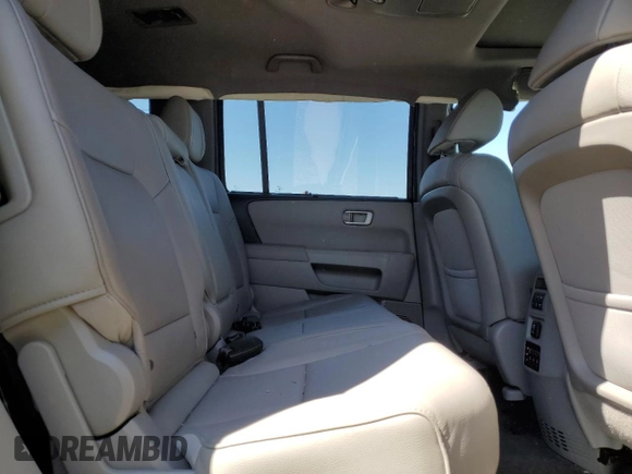 2013 Honda Pilot Touring с VIN 5FNYF4H92DB083790, выставлен на аукционе Copart как лот 56335425 с пробегом 119 330 миль миль и На запчасти • Non repairable. История ставок и продаж доступна на DreamBid. Изображение 11.