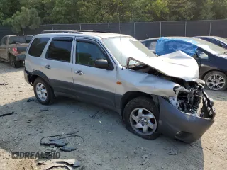 2003 Mazda Tribute DX with VIN 4F2YZ02B83KM52472, listed as a Copart auction lot 68642804 with 179,193 mi miles and Salvage Title. Bid and sale history available at carsss.com. Image 4.
