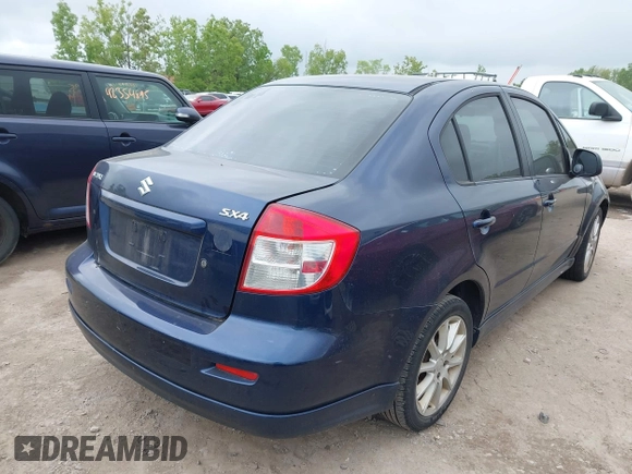 2009 Suzuki SX4 Sport FWD z VIN JS2YC414196200260, wystawiony jako IAAI lot #42354835 z przebiegiem 175 909 mil mil oraz . Historia ofert i sprzedaży dostępna na DreamBid. Obrazek 4.