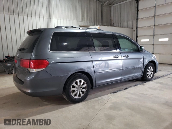 2010 Honda Odyssey EX-L with VIN 5FNRL3H76AB113634, listed as a Copart auction lot 53881045 with 214,478 mi miles and Salvage Title. Bid and sale history available at carsss.com. Image 3.