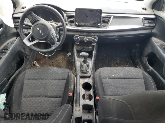2022 Kia Rio LX with VIN 3KPA24AD7NE486506, listed as a Copart auction lot 64212244 with 52,852 mi miles and Salvage Title. Bid and sale history available at carsss.com. Image 8.