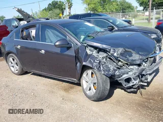2014 Chevrolet Cruze 2LT z VIN 1G1PE5SB5E7413499, wystawiony jako IAAI lot #42256548 z przebiegiem Nie podano mil oraz . Historia ofert i sprzedaży dostępna na DreamBid. Obrazek 1.