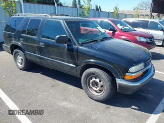 2000 Chevrolet Blazer LT z VIN 1GNDT13W0Y2353621, wystawiony jako IAAI lot #42053605 z przebiegiem 164 160 mil mil oraz . Historia ofert i sprzedaży dostępna na DreamBid. Obrazek 1.