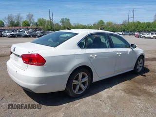 2012 Volkswagen Passat SE w/Sunroof with VIN 1VWBH7A39CC097668, listed as a IAAI auction lot 42100044 with 126,637 mi miles. Bid and sale history available at carsss.com. Image 4.