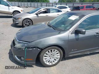 2010 Ford Fusion Hybrid with VIN 3FADP0L37AR270739, listed as a IAAI auction lot 42143035 with 238,111 mi miles. Bid and sale history available at carsss.com. Image 12.