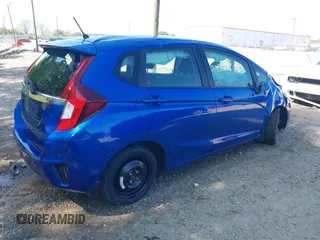 2015 Honda Fit EX-L with VIN 3HGGK5H86FM751434, listed as a IAAI auction lot 42065501 with 106,546 mi miles. Bid and sale history available at carsss.com. Image 4.