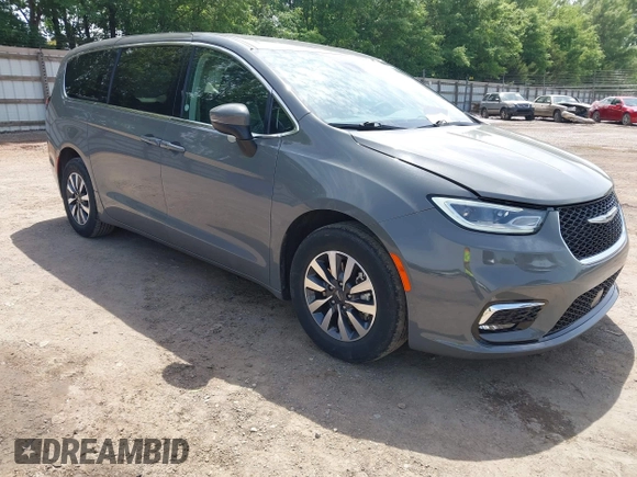2023 Chrysler Pacifica Hybrid Touring L with VIN 2C4RC1L73PR522988, listed as a IAAI auction lot 42280263 with 54,939 mi miles and . Bid and sale history available at DreamBid. Image 1.