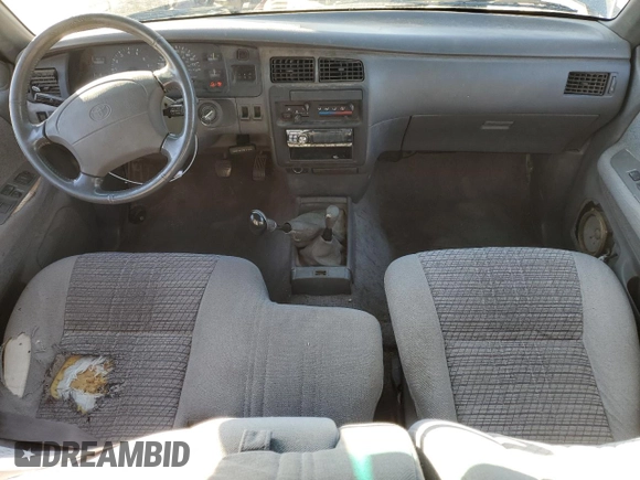 1995 Toyota T100 z VIN JT4VD22F4S0008399, wystawiony jako Copart lot #42249755 z przebiegiem 282 751 mil mil oraz Czysty tytuł • Clean title. Historia ofert i sprzedaży dostępna na DreamBid. Obrazek 8.