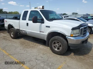 2004 Ford Super Duty F-250 XL with VIN 1FTNX21P14EC94526, listed as a Copart auction lot 71207774 with 176,238 mi miles and Salvage Title. Bid and sale history available at carsss.com. Image 4.