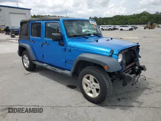 2015 Jeep Wrangler Unlimited Willys Wheeler with VIN 1C4BJWDG4FL611656, listed as a Copart auction lot 54010395 with 129,797 mi miles and Salvage Title. Bid and sale history available at DreamBid. Image 4.