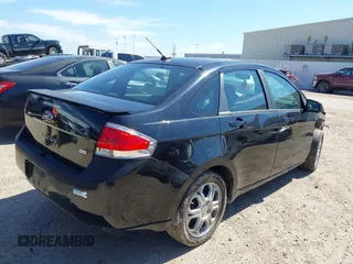 2008 Ford Focus SE with VIN 1FAHP35N78W262939, listed as a IAAI auction lot 41655534 with 274,086 mi miles. Bid and sale history available at carsss.com. Image 4.