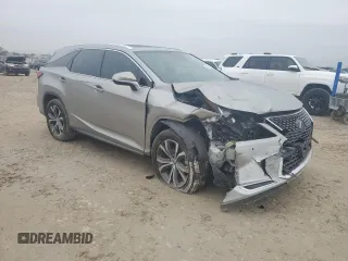2021 Lexus RX 350L with VIN JTJHZKEA3M2022121, listed as a Copart auction lot 83263024 with 39,684 mi miles and Salvage title. Bid and sale history available at DreamBid. Image 4.