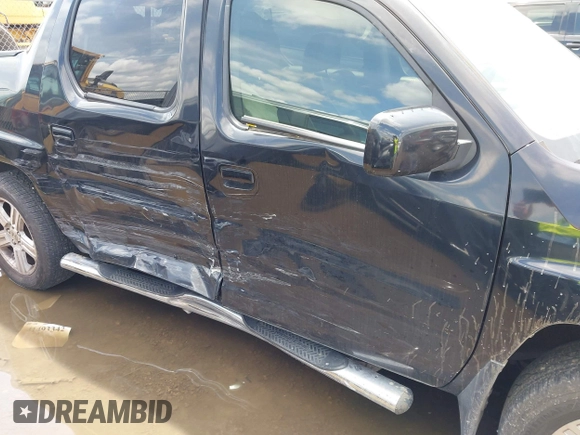 2011 Honda Ridgeline RTL with VIN 5FPYK1F54BB011472, listed as a IAAI auction lot 42112512 with 194,974 mi miles and . Bid and sale history available at DreamBid. Image 13.