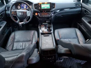 2023 Honda Passport Elite with VIN 5FNYF8H09PB016410, listed as a Copart auction lot 85071544 with 54,327 mi miles and Salvage Title. Bid and sale history available at carsss.com. Image 8.