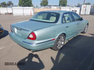 2004 Jaguar XJ 8 with VIN SAJEA71CX4SG10751, listed as a IAAI auction lot 42149348 with 89,786 mi miles and . Bid and sale history available at DreamBid. Image 4.