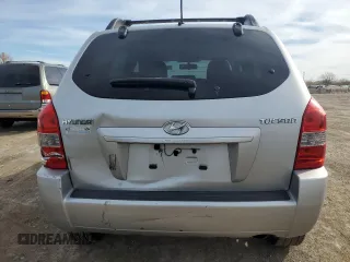 2009 Hyundai Tucson GLS with VIN KM8JM12B79U012399, listed as a Copart auction lot 77663414 with 164,615 mi miles and Salvage Title. Bid and sale history available at carsss.com. Image 6.