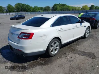 2013 Ford Taurus SEL with VIN 1FAHP2E80DG179961, listed as a IAAI auction lot 42088532 with 131,196 mi miles and . Bid and sale history available at carsss.com. Image 4.