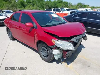 2010 Toyota Corolla with VIN 1NXBU4EE2AZ165885, listed as a IAAI auction lot 42007789 with 150,649 mi miles. Bid and sale history available at carsss.com. Image 1.