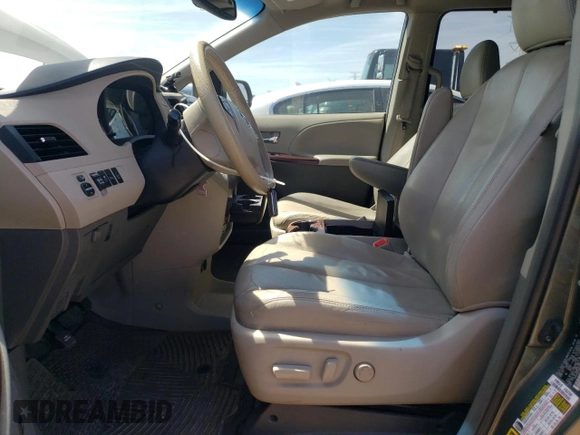 2013 Toyota Sienna XLE AAS с VIN 5TDYK3DC2DS313685, выставлен на аукционе Copart как лот 56064505 с пробегом 115 624 миль миль и Списание • Salvage title. История ставок и продаж доступна на DreamBid. Изображение 7.
