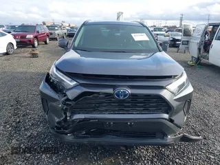 2023 Toyota RAV4 Hybrid XLE with VIN JTMRWRFV2PD201561, listed as a IAAI auction lot 41576987 with 30,417 mi miles. Bid and sale history available at carsss.com. Image 12.