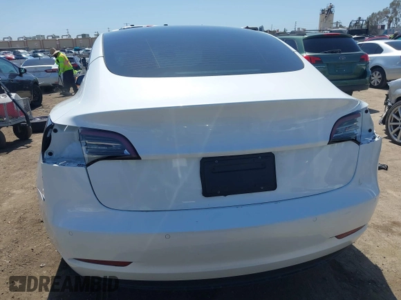 2022 Tesla Model 3 Long Range with VIN 5YJ3E1EB1NF289719, listed as a IAAI auction lot 41968273 with 73,368 mi miles and . Bid and sale history available at DreamBid. Image 17.