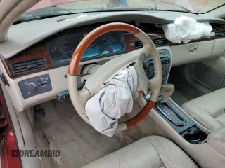2002 Cadillac Eldorado z VIN 1G6EL12Y82B102243, wystawiony jako Copart lot #72717014 z przebiegiem 165 442 mil mil oraz Czysty tytuł • Clean title. Historia ofert i sprzedaży dostępna na DreamBid. Obrazek 8.