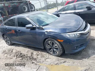 2018 Honda Civic EX-L z VIN JHMFC1F73JX018222, wystawiony jako IAAI lot #41962918 z przebiegiem 92 806 mil mil oraz . Historia ofert i sprzedaży dostępna na DreamBid. Obrazek 1.