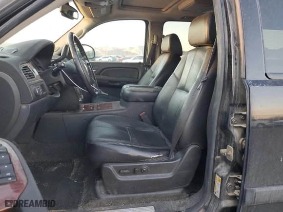 2007 Chevrolet Suburban LT with VIN 1GNFC16JX7J300857, listed as a Copart auction lot 43244695 with 200,338 mi miles and Clean Title. Bid and sale history available at carsss.com. Image 7.