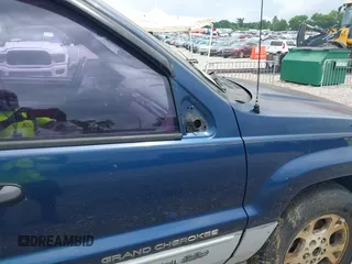 2000 Jeep Grand Cherokee Laredo z VIN 1J4GW48S9YC338947, wystawiony jako IAAI lot #42545830 z przebiegiem 234 251 mil mil oraz . Historia ofert i sprzedaży dostępna na DreamBid. Obrazek 6.
