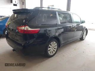 2015 Toyota Sienna Limited with VIN 5TDDK3DC9FS104493, listed as a IAAI auction lot 42055937 with 126,728 mi miles and . Bid and sale history available at DreamBid. Image 4.