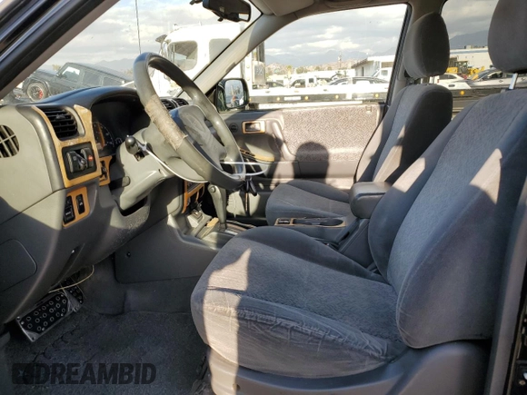 2001 Isuzu Rodeo S with VIN 4S2CK58W814333364, listed as a Copart auction lot 84656114 with 140,489 mi miles and Salvage title. Bid and sale history available at DreamBid. Image 7.