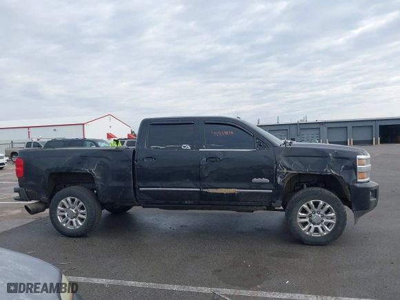 2015 Chevrolet Silverado 2500HD Built After Aug 14 High Country with VIN 1GC1KXE84FF536963, listed as a IAAI auction lot 41439878 with 191,471 mi miles. Bid and sale history available at carsss.com. Image 13.