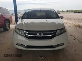 2017 Honda Odyssey Touring with VIN 5FNRL5H94HB007979, listed as a Copart auction lot 56755435 with 125,821 mi miles and Salvage title. Bid and sale history available at DreamBid. Image 5.