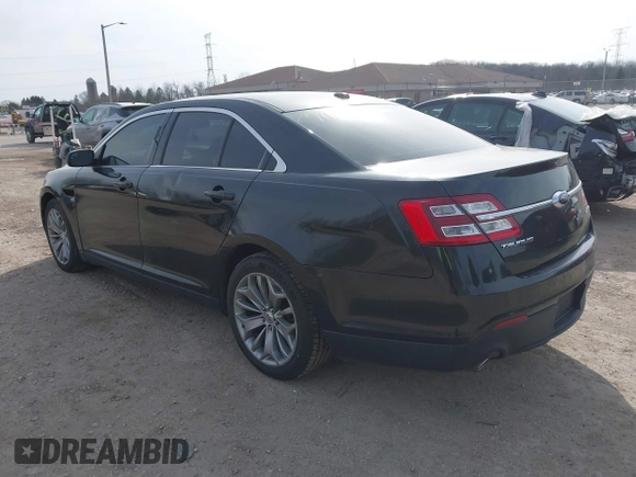2013 Ford Taurus Limited with VIN 1FAHP2F80DG114817, listed as a IAAI auction lot 41865803 with 207,132 mi miles. Bid and sale history available at carsss.com. Image 3.