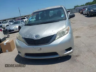 2014 Toyota Sienna L with VIN 5TDZK3DC1ES410012, listed as a IAAI auction lot 42005001 with 440,789 mi miles. Bid and sale history available at carsss.com. Image 12.