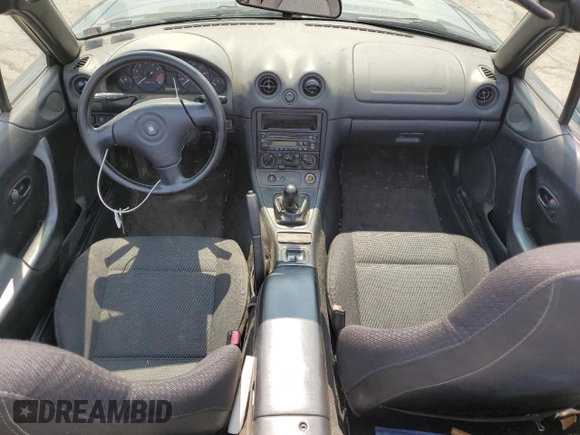 2000 Mazda MX-5 Miata with VIN JM1NB3533Y0151883, listed as a Copart auction lot 64423925 with 180,275 mi miles and Salvage title. Bid and sale history available at DreamBid. Image 8.