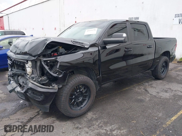 2019 Ram 1500 Big Horn/Lone Star with VIN 1C6SRFFT9KN625013, listed as a IAAI auction lot 41611276 with 100,463 mi miles. Bid and sale history available at carsss.com. Image 18.