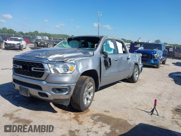 2022 Ram 1500 Lone Star with VIN 1C6RREFT3NN336321, listed as a IAAI auction lot 42190485 with 106,221 mi miles and . Bid and sale history available at DreamBid. Image 2.