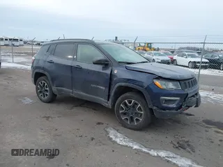 2020 Jeep Compass Trailhawk with VIN 3C4NJDDB3LT143926, listed as a IAAI auction lot 41368613 with 61,909 mi miles and . Bid and sale history available at carsss.com. Image 1.