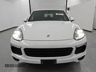 2016 Porsche Cayenne with VIN WP1AA2A28GLA01613, listed as a Copart auction lot 46182805 with 121,911 mi miles and Clean Title. Bid and sale history available at carsss.com. Image 5.