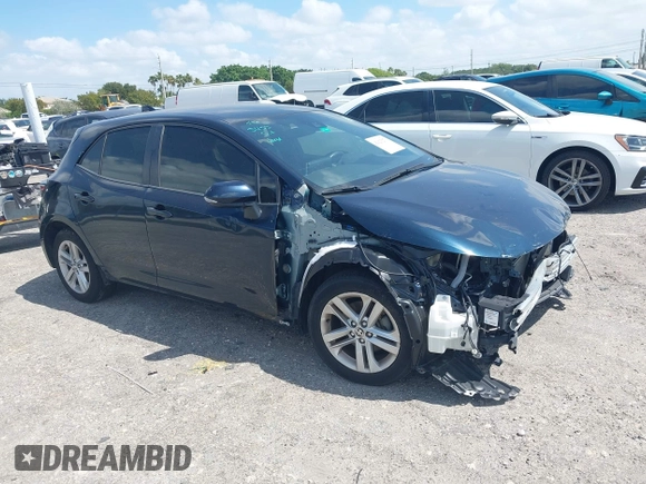 2019 Toyota Corolla Hatchback SE with VIN JTNK4RBE3K3061589, listed as a IAAI auction lot 42123273 with 90,491 mi miles. Bid and sale history available at carsss.com. Image 1.