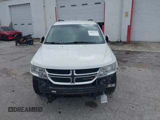 2012 Dodge Journey SXT with VIN 3C4PDCBG3CT331693, listed as a IAAI auction lot 42624751 with 165,480 mi miles and . Bid and sale history available at DreamBid. Image 6.