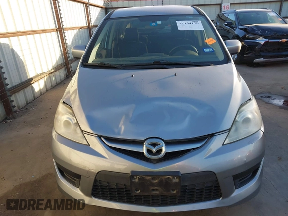 2010 Mazda 5 Sport z VIN JM1CR2W30A0384041, wystawiony jako IAAI lot #41134158 z przebiegiem 178 540 mil mil oraz . Historia ofert i sprzedaży dostępna na DreamBid. Obrazek 6.