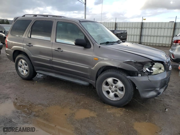 2003 Mazda Tribute LX with VIN 4F2YZ04133KM26091, listed as a Copart auction lot 86595334 with 194,280 mi miles and Salvage Title. Bid and sale history available at carsss.com. Image 4.