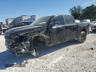 2021 Ram 1500 Lone Star with VIN 1C6RREFT2MN660620, listed as a Copart auction lot 49831035 with 49,276 mi miles and Salvage title. Bid and sale history available at DreamBid. Image 1.
