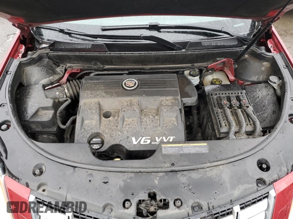 2014 Cadillac SRX Premium Collection z VIN 3GYFNGE35ES637645, wystawiony jako Copart lot #50005225 z przebiegiem 119 108 mil mil oraz Szkoda całkowita • Salvage title. Historia ofert i sprzedaży dostępna na DreamBid. Obrazek 11.