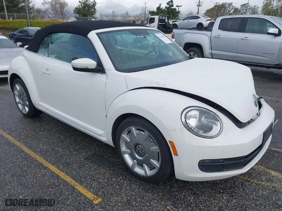 2013 Volkswagen Beetle Convertible 2.5L with VIN 3VW5P7AT9DM825439, listed as a IAAI auction lot 41760907 with 53,649 mi miles. Bid and sale history available at carsss.com. Image 1.