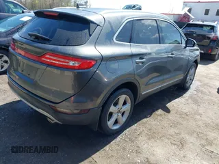 2017 Lincoln MKC Premiere with VIN 5LMCJ1C91HUL68453, listed as a IAAI auction lot 41972883 with 75,363 mi miles and . Bid and sale history available at DreamBid. Image 4.